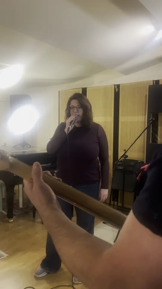 Maria singing during the Highway Tune rehearsal recording.