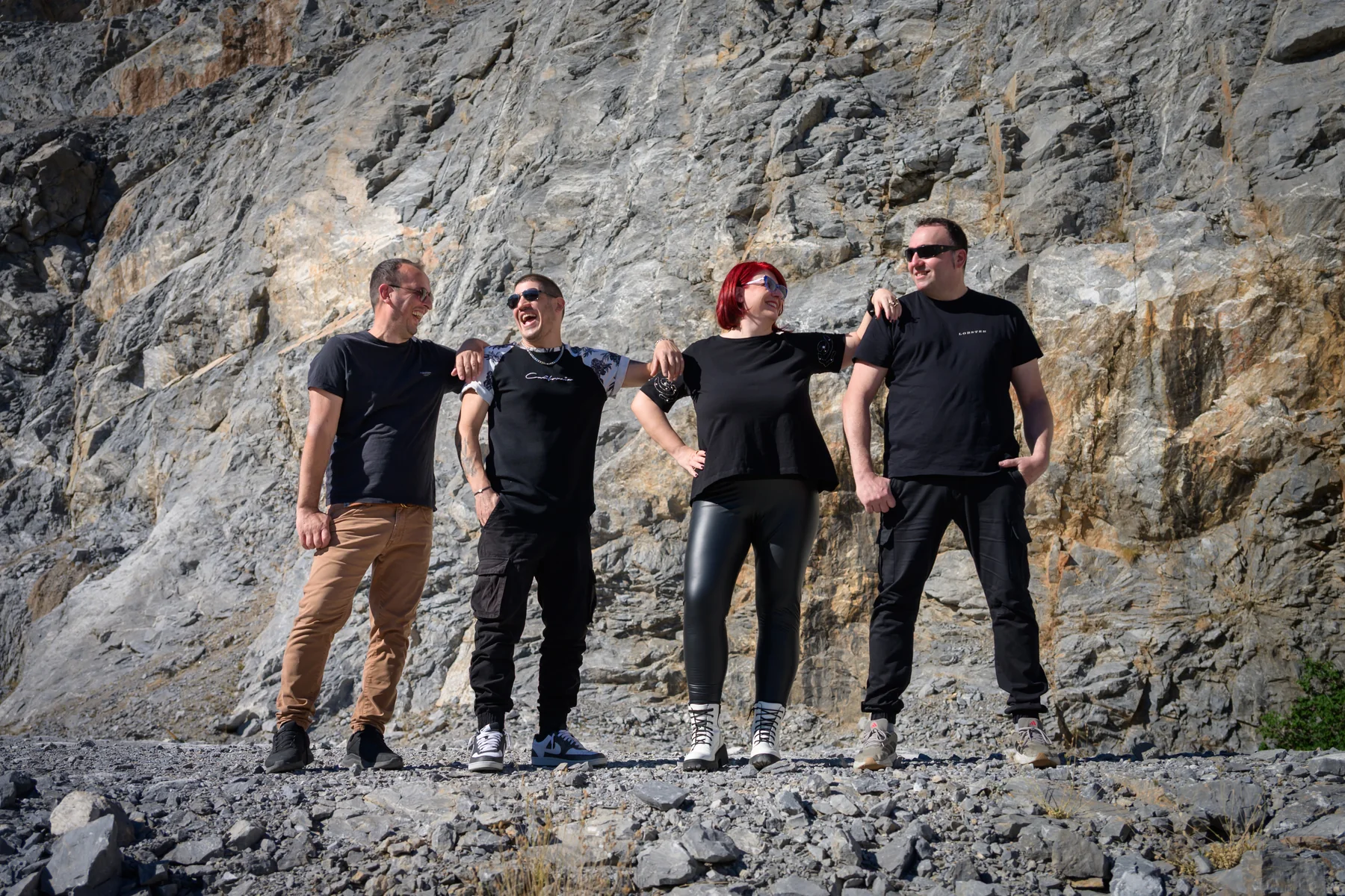 The band laughing together at the Asvestochori photoshoot.